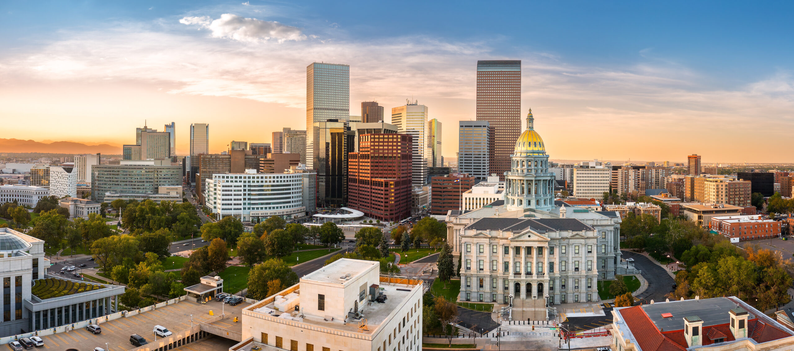 Denver, Colorado skyline and Colorado Capitol at sunset